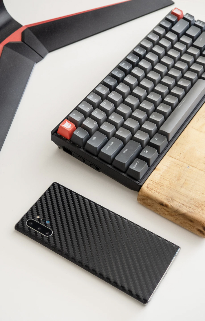 Keyboard and phone on a table